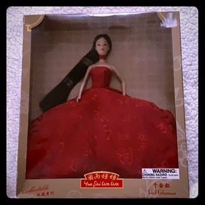 Collectible 11 in doll with red ball gown